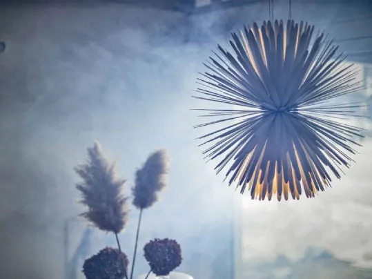 Lampada a sospensione in acciaio Sun Light of Love di Foscarini