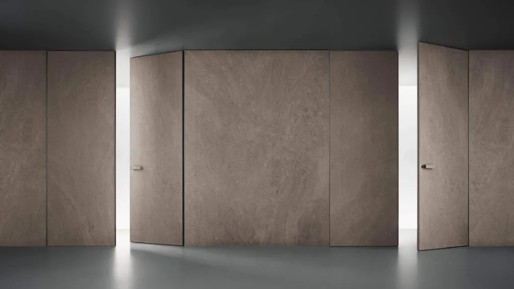 Porta a battente per interni Moon in finitura Gres Moka di Rimadesio