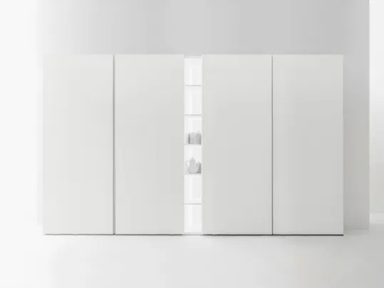 Armadio dispensa in essenza natural wood con ante complanari di Caccaro
