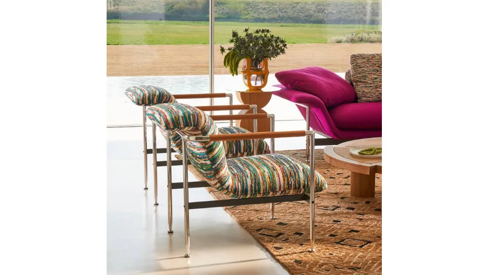Poltroncina di design in tessuto Esosoft di Cassina