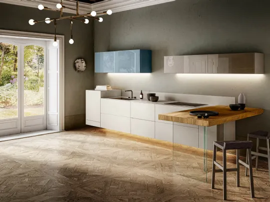 Cucina Design 36e8 Fenix con pensili in vetro laccato lucido e penisola in legno con base in vetro temperato trasparente di Lago