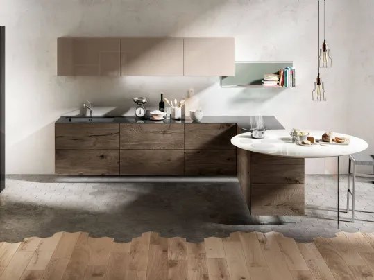 Cucina Design a isola con fuochi integrati nel piano rotondo in vetro Air Bianco lucido di Lago