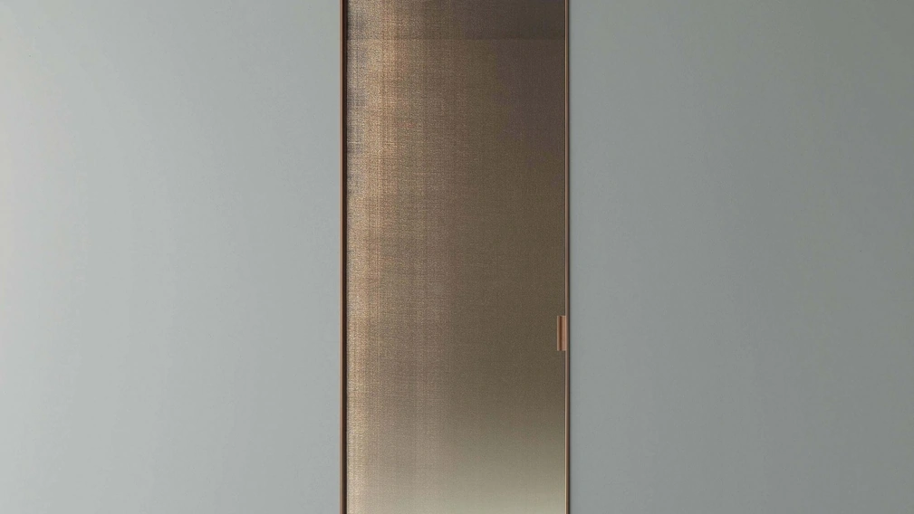 Porta per interni scorrevole Vela in vetro rete bronzo di Rimadesio