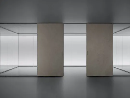Parete divisoria Spazio e Graphis Plus in vetro e Gres con struttura in alluminio finitura platino di Rimadesio